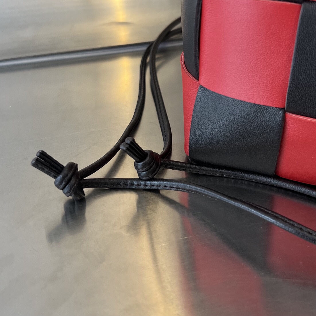 BOTTEGA VENETA SMALL CASSETTE BUCKET 18 IN RED MIX BLACK CALFSKIN