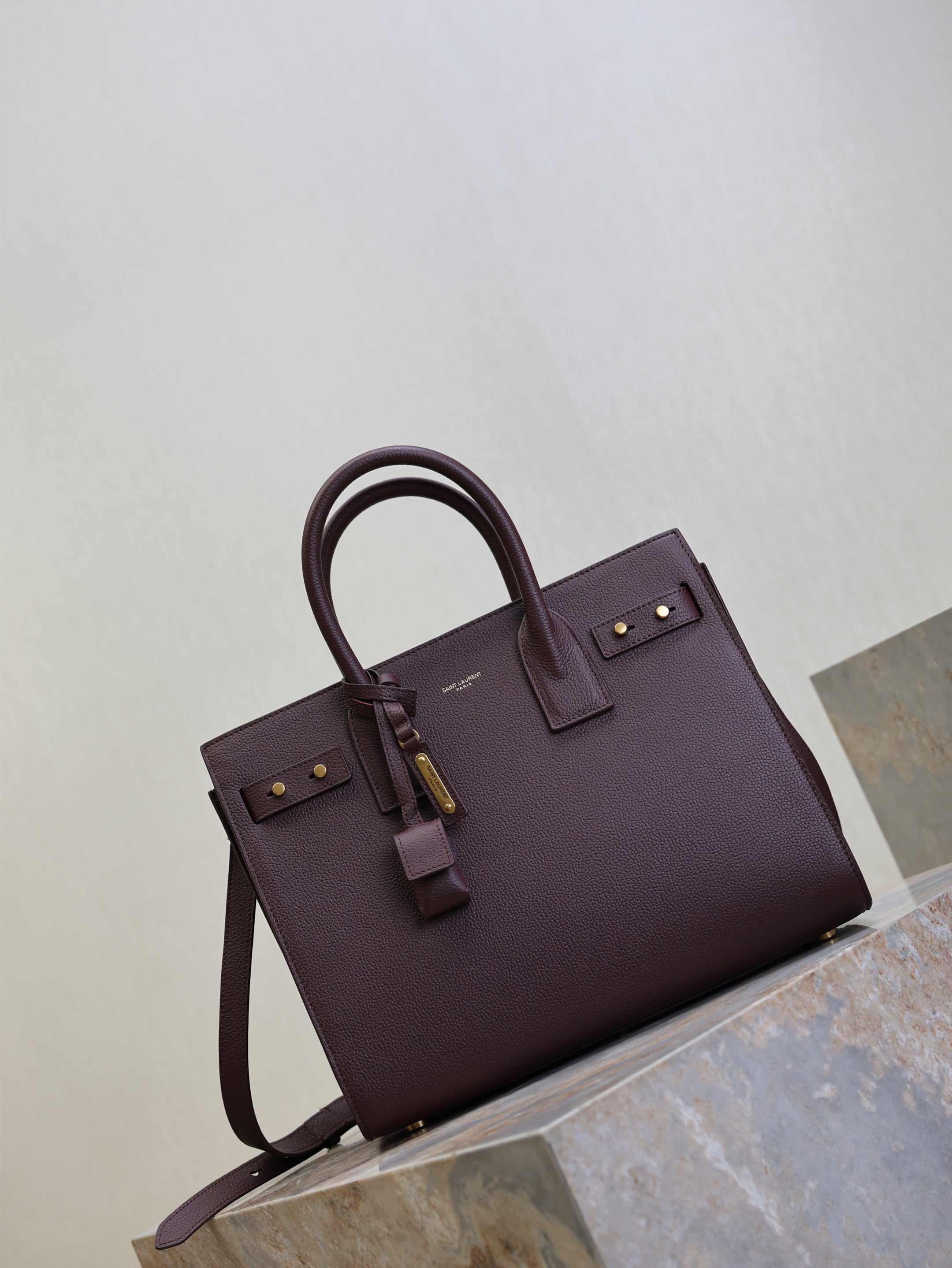 YSL 25S SAC DE JOUR GM 32 IN ROUGE CABERNET SUPPLE GRAINED CALFSKIN