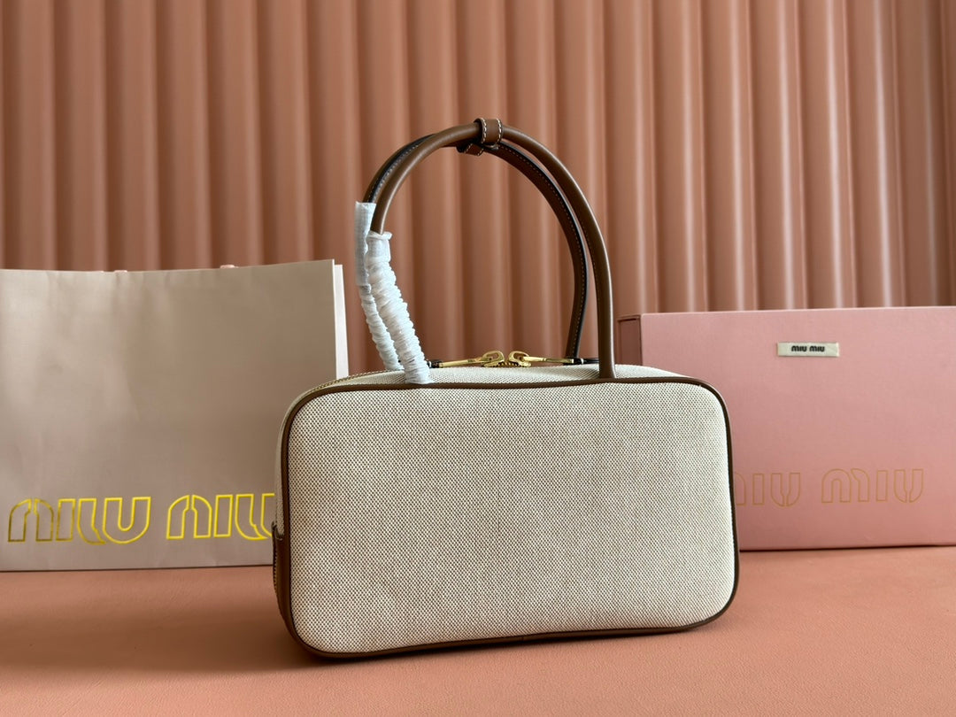 BOWLING BAG 28 IN WHITE CANVAS AND BROWN CALFSKIN TRIM