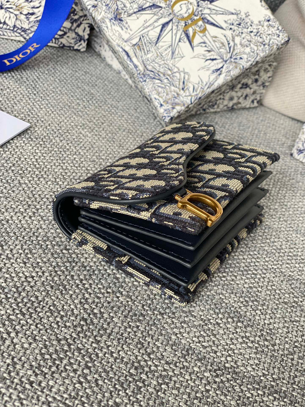 SADDLE LOTUS WALLET 11 IN BLACK MONOGRAM OBLIQUE JACQUARD