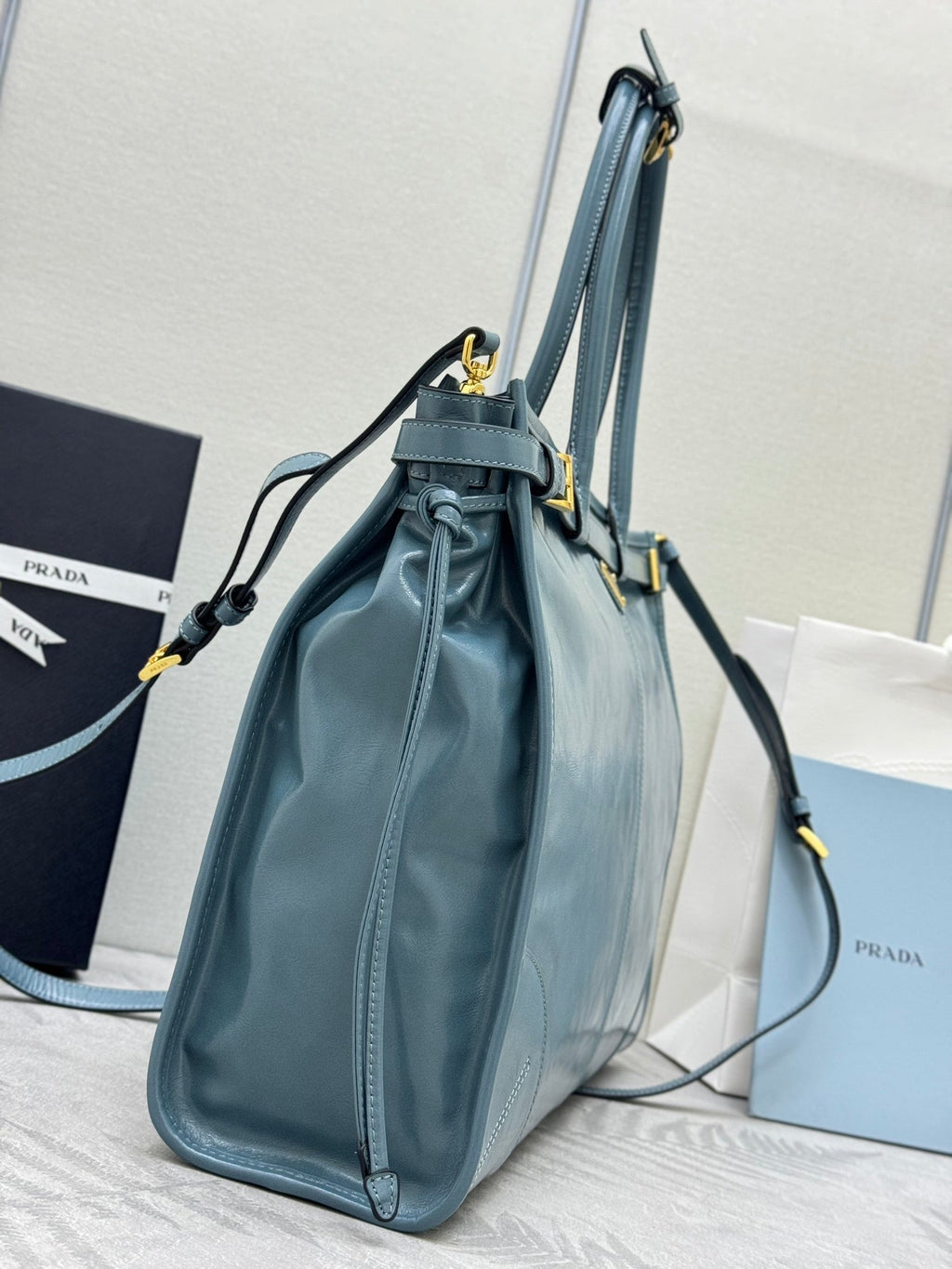PRADA 25S LUX SOFT BAG 42 IN BLUE GLOSSY CALFSKIN GOLD HARDWARE